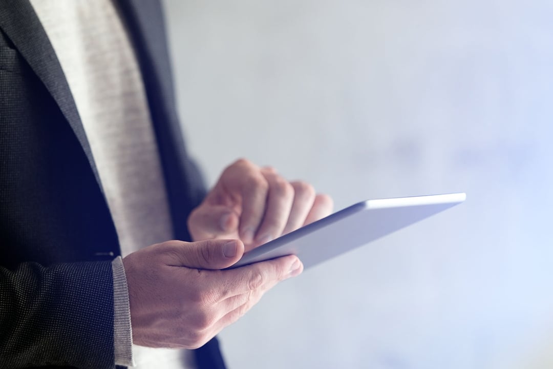 Man holding tablet