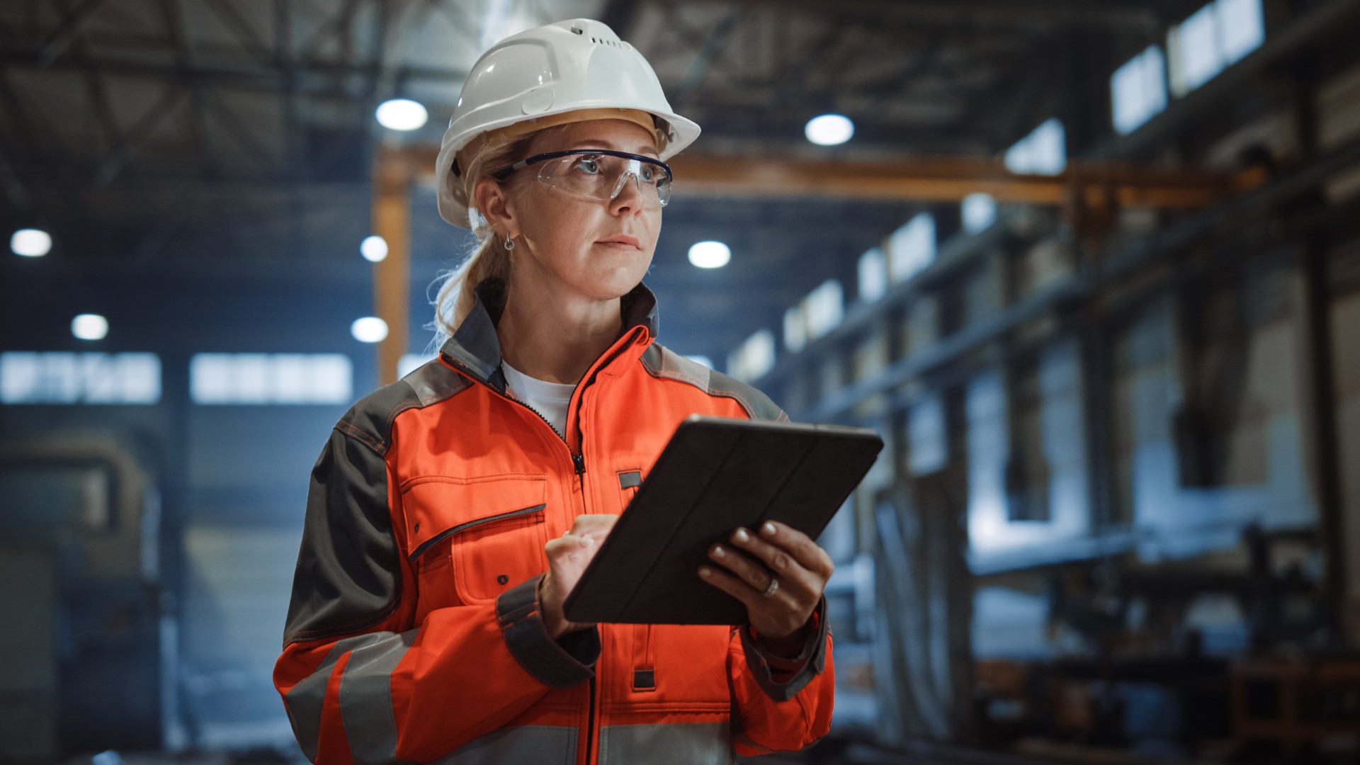 woman manufacturing factory tablet.jpeg